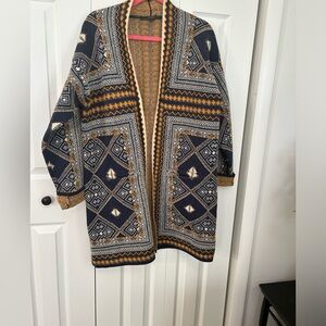 Beautiful sweater coat with graphic print.NWT